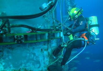 Diver welding on an underwater rig