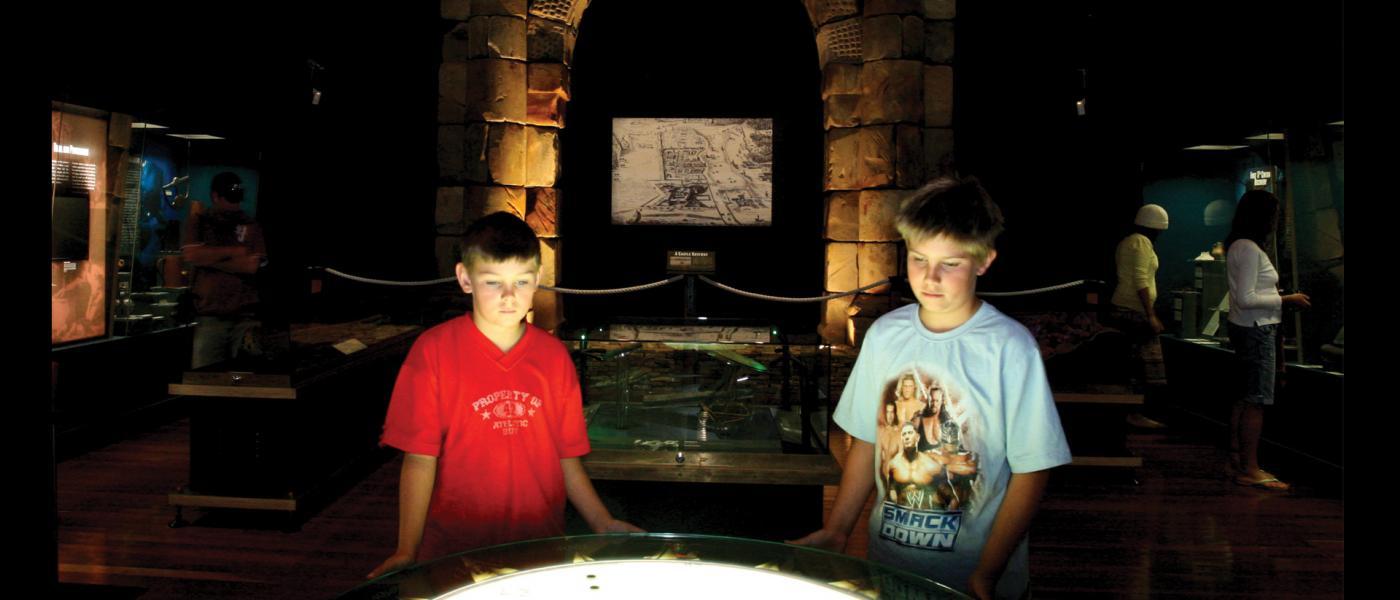 Two kids at an exhibition in Museum of Geraldton