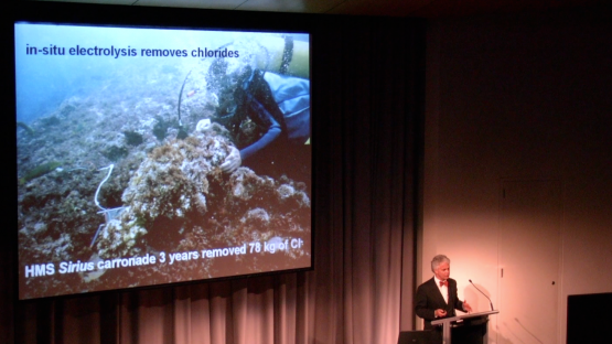 Shipwrecks and Chemists - Doctor Ian MacLeod giving a lecture in the Maritime Museum in front of a screen