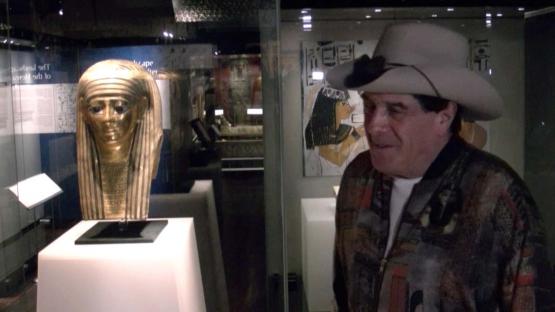 Secrets of the Afterlife Molly Meldrum - Molly Meldrum Standing next to a Egyptian gold mask