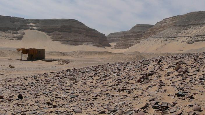 A modern photo of Umm el-Qa’ab, Abydos, Egypt and the mounds of pots still visible on the surface - Photo by Heather Tunmore, Image copyright Heather Tunmore A sweeping landscape of Egypt