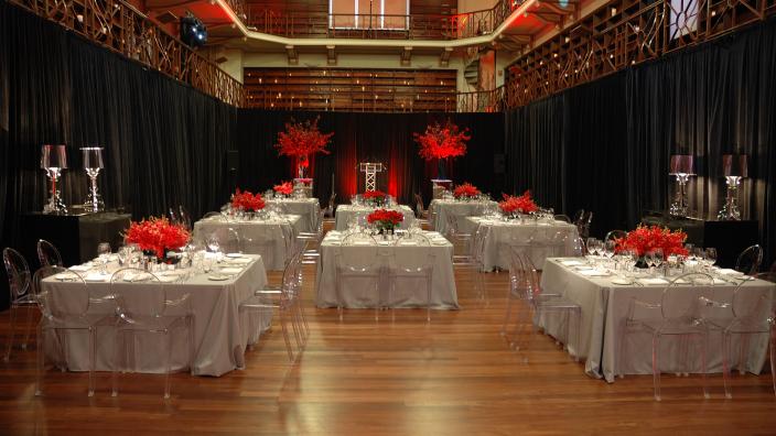 Hackett Hall Gallery set with dinning tables for a banquet