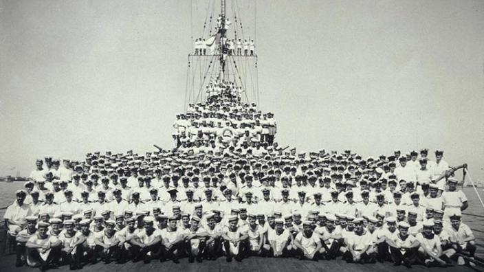 Portrait of the crew in full uniform after a successful mission in the Mediterranean The full crew of the HMAS Sydney (II) in full uniform on the deck of the Sydney