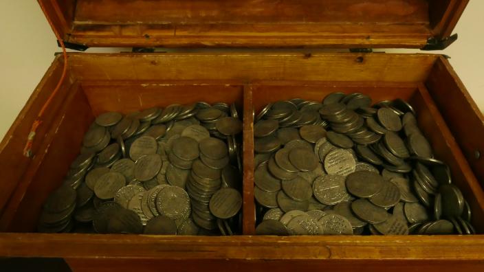 Treasure Chest A wooden box filled with coins