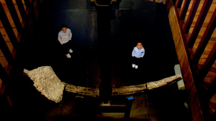 Shipwreck Anchor - Image copyright of the Western Australian Museum Aerial view of an anchor, with a child standing beneath