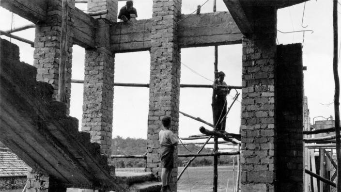 Building construction at Bindoon Boys Town, WA 1952 - Reproduced courtesy of State Library of Western Australia, Battye Library. A building site from WA shown during the early 1950s