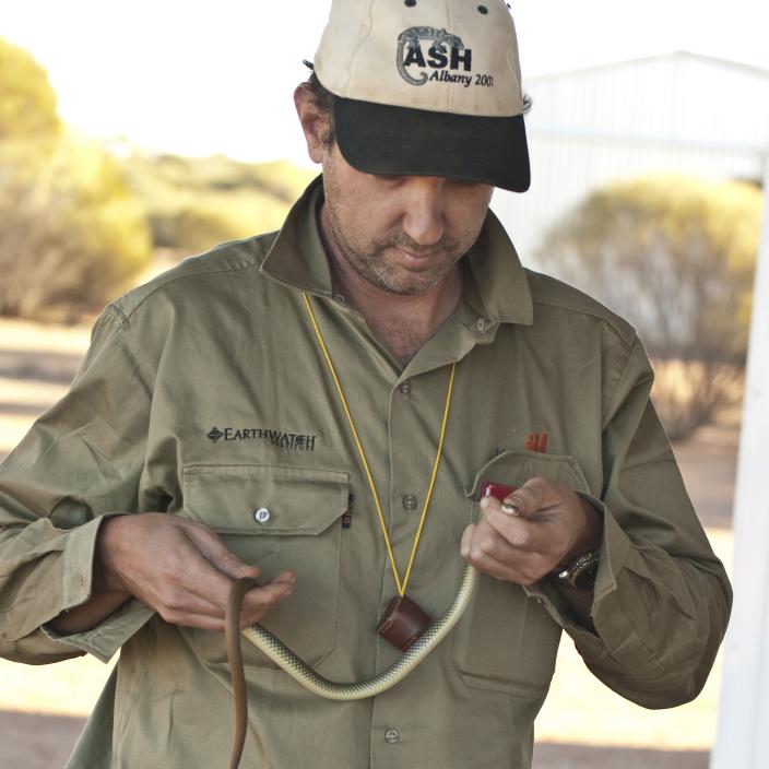 Paul Doughty holding a snake