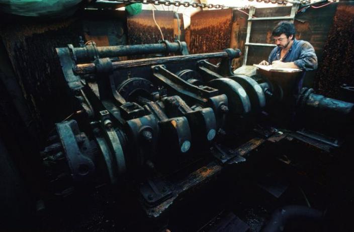 The deconcreted engine Scientist inspecting a cleaned engine