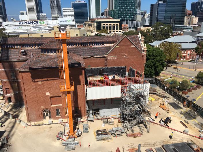 View looking down on heritage building with scaffolding in front