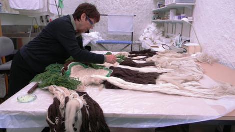 Maggie Myers - performing textiles conservation 