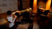 Cannon - Image copyright of the Western Australian Museum A child looking into a cannon which has been recovered from a shipwreck