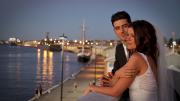 Maritime Museum Function Centre Balcony Bride and Groom overlook harbour at night on Maritime Museum Function Centre Balcony