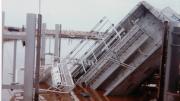 A fishing boat half immersed in water, post Cyclone Vance