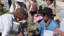 Geoff Deacon helping identify fossils found at Tims Thicket Image copyright of WA Museum Photo by Marlene Anderson