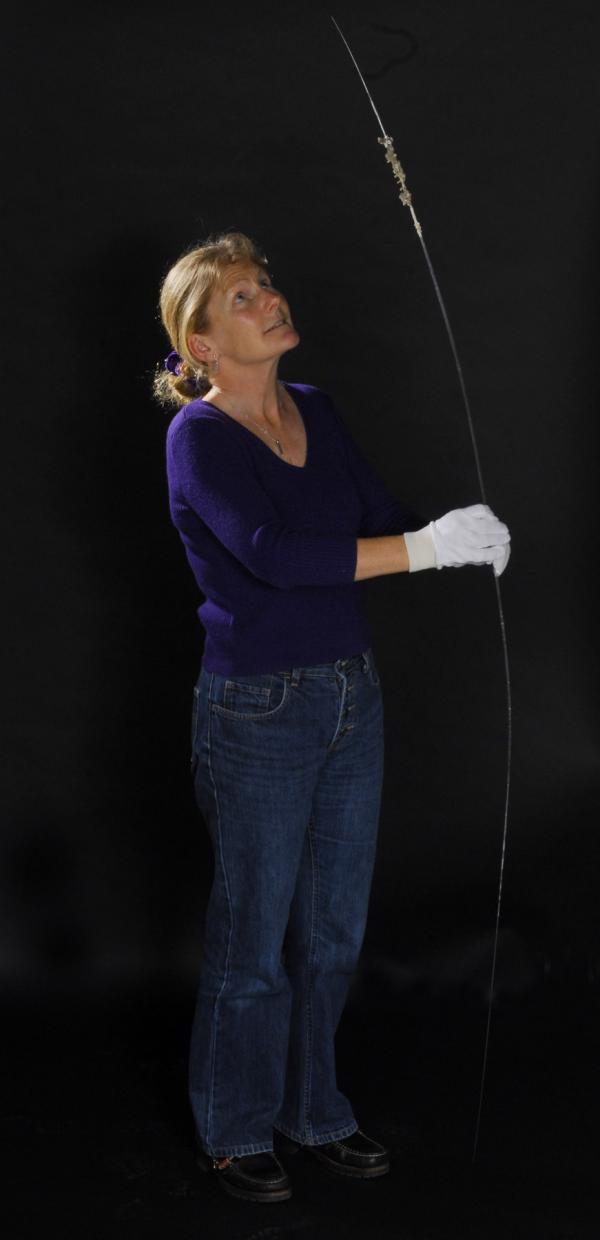 Jane holding her favourite sponge spicule from a deep sea glass sponge