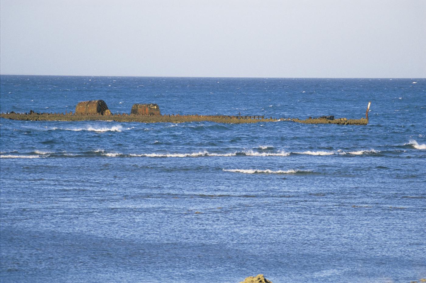 Image of the ocean coast line showing the tip of the Mildura Wreck