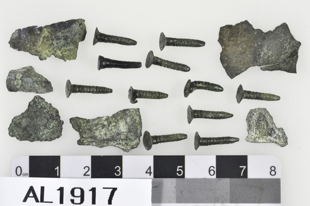 Copper/brass artefact recovered from Alice
