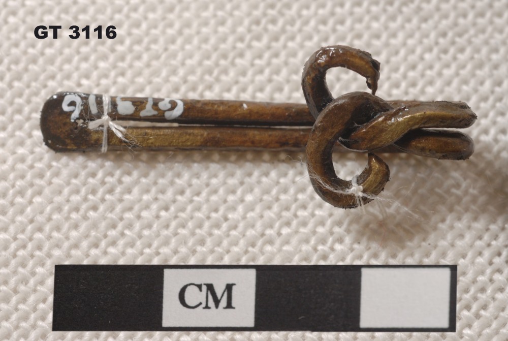 Copper/brass artefact recovered from Vergulde Draeck (Gilt Dragon)