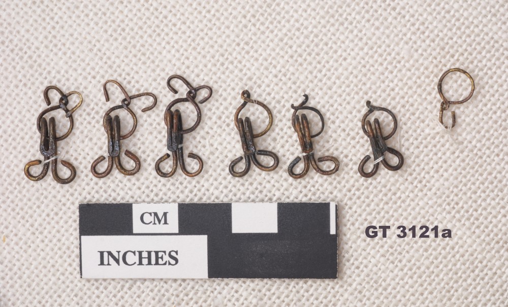 Copper/brass artefact recovered from Vergulde Draeck (Gilt Dragon)