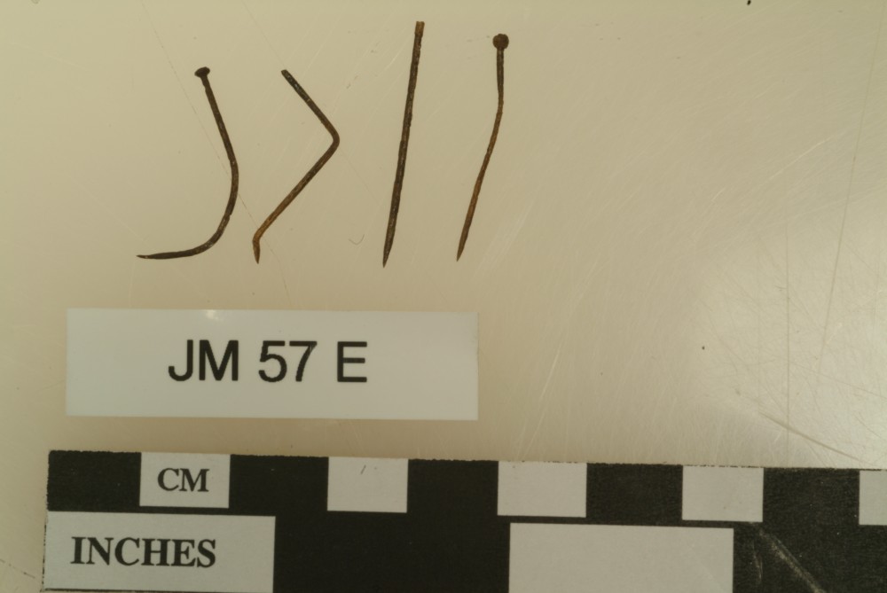 JM57E Copper/brass artefact recovered from James Matthews