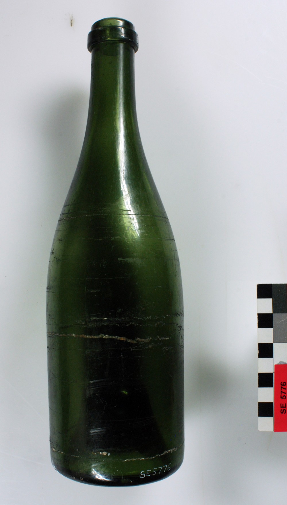 SE5776 Glass artefact recovered from Sepia