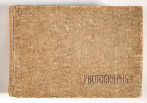 Photograph Album and newspaper clipping