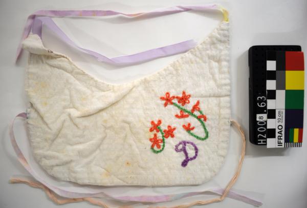 BIB, white searsucker, hand stitched, purple embroidered 'D'