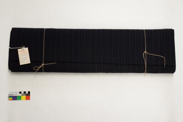 BOLT OF FABRIC, wool, black with feint white and blue pin-stripe, tied with string