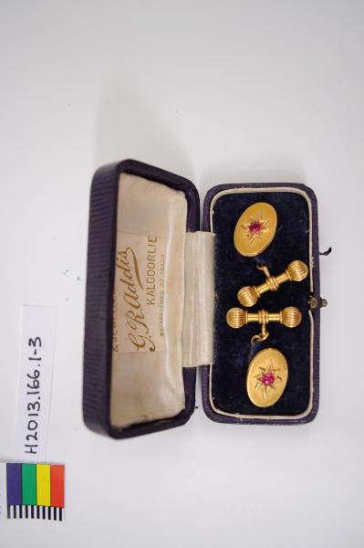 CUFF LINKS, pair, in case, rubies set in gold, Addis