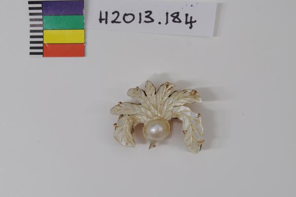 BROOCH, blister pearl carved pearl shell on gold setting, Donovan & Overland