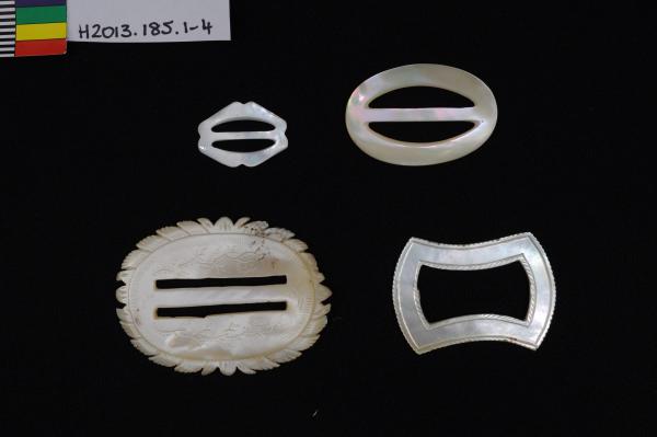 BUCKLES x 4, carved pearlshell