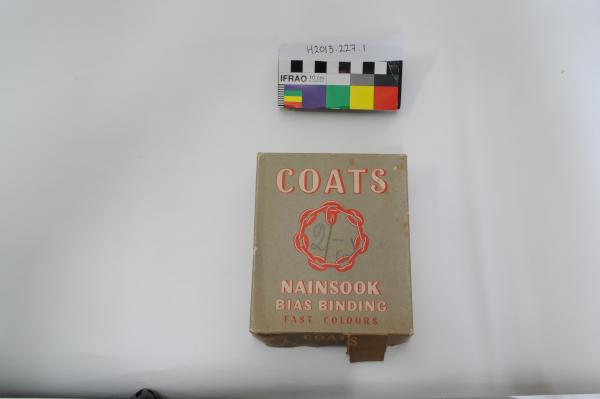 CONTAINER, with lid, ‘COATS NAINSOOK’, with 4 cards of bias binding
