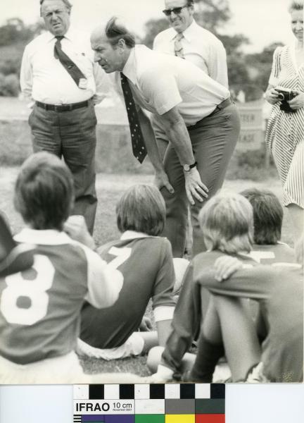 PHOTOGRAPH, b&w, soccer, Bobby Charlton(?), with youth soccer squad