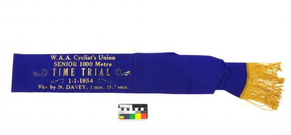 SASH, cycling, blue/gold, 'W.A.A. Cyclist's Union/ SENIOR 1000 Metre', 1 January 1954, Noel Davey