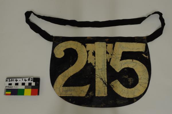 COMPETITORS BIB, cycling, black/white painted leather?, '215',  'WARNAMBOOL - MELBOURNE', 1929