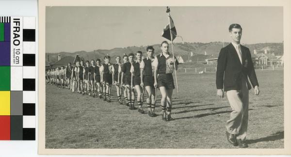 PHOTOGRAPH, b&w, WA Colts Men's Hockey Team, marching, Adelaide, 1953