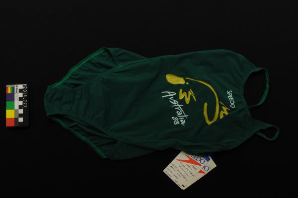 SWIMSUIT,  female, Speedo, one-piece, dark green with muted yellow platypus 'Australia '88', nylon lycra paper, superback, 1988 Seoul Olympic Games