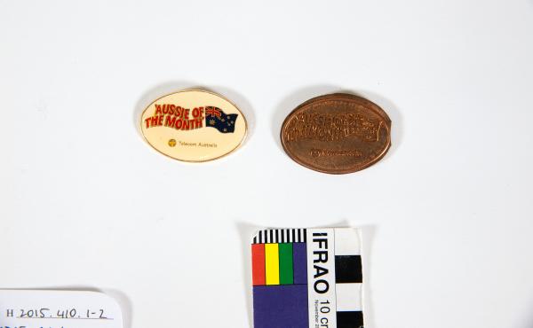 BADGE, oval, Telecom Australia, 'AUSSIE OF THE MONTH'