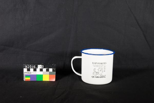 MUG, enamel, white, blue rim, cartoon of sheep, 'RAINMAKERS', 'B&S BALL 2005 QUAIRADING'