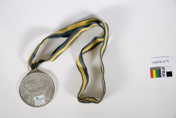 MEDAL, 'ADVANCE AUSTRALIA AWARD/ BEN LEXCEN', circular silver metal, green ribbon wih  yellow stripes