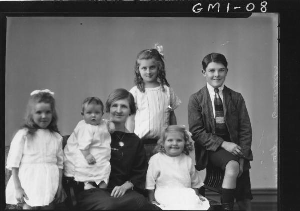 Family portrait woman and five children, H/S, Mrs 'Ogg'.