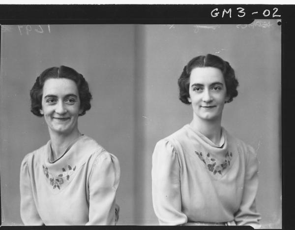 Two portrait poses of a woman, H/S, 'Isaacs'. In long sleeved embroidered dress.