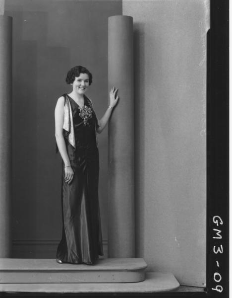 Portrait of a woman in evening dress, F/L, 'James'.