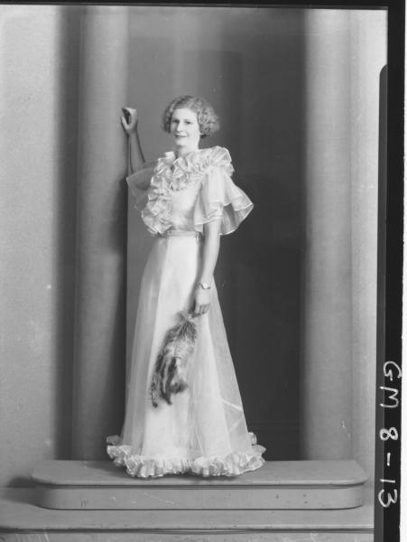 Poartrait of young woman in evening dress, F/L Kenning.