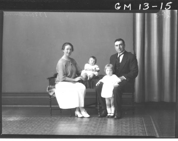 Portrait of a woman, man and two children, 'Dunne'