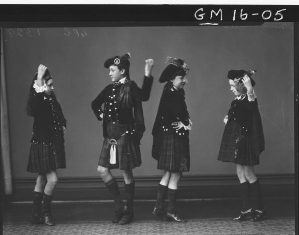 four young people in scottish costume dancing a jig F/L     'Brown' and 'Mills'