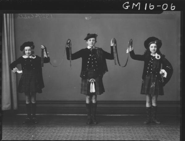 three young people in scottish costume F/L, 'Brown' and 'Mills'
