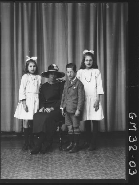 portrait of woman and three children, F/L Smith