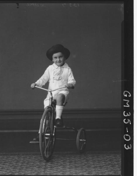 portrait of small boy riding tricycle, F/L Wilkie