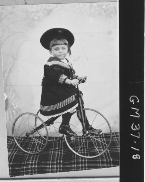 copy of early portrait, young boy on tricycle, Pritchard